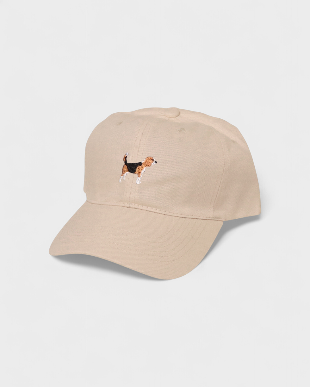 Beige baseball cap with embroidered Beagle design and customizable text on the back.