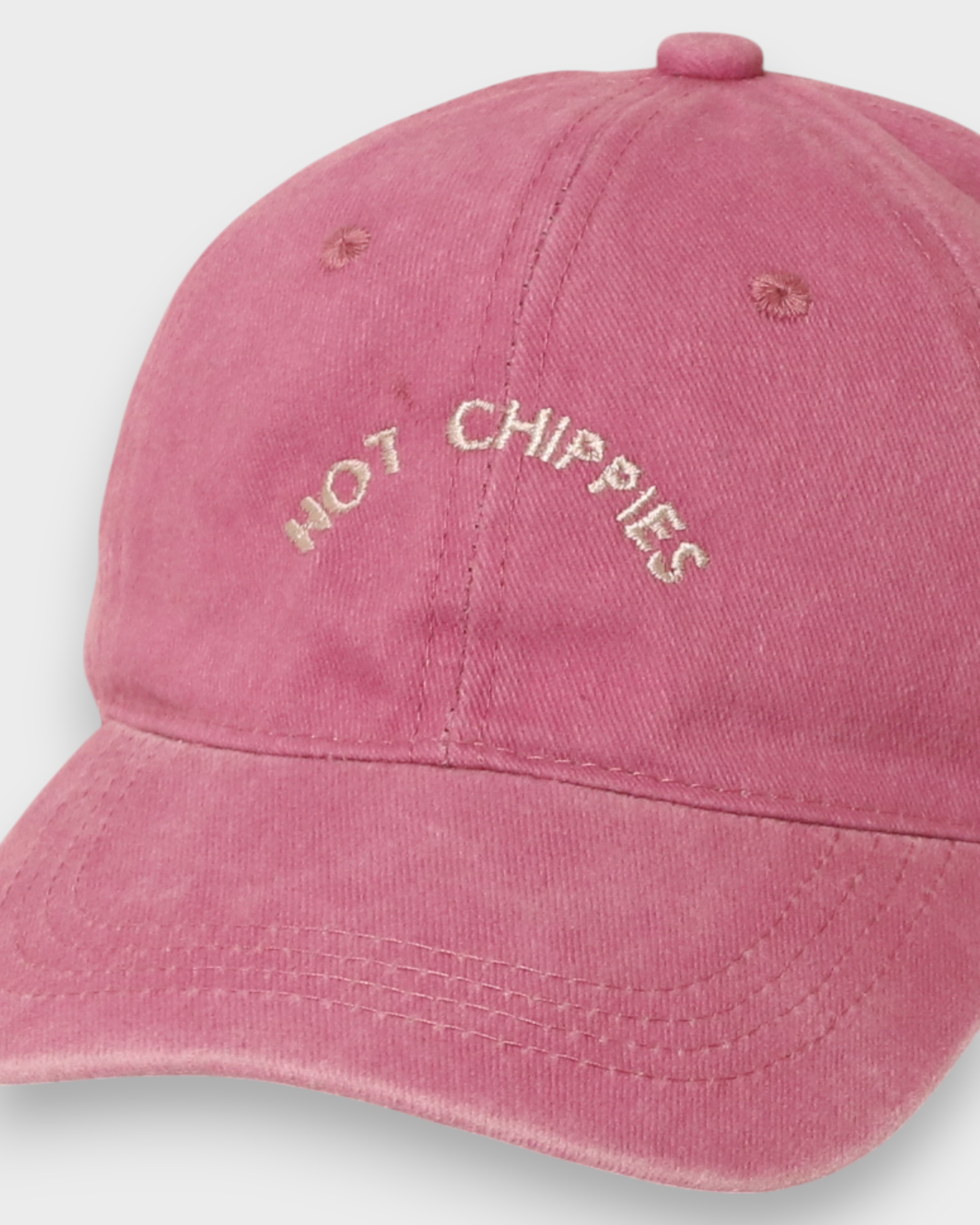 Pink Hot Chippies Personalised Hat with embroidered front text, made of 100% washed cotton in a classic baseball fit.