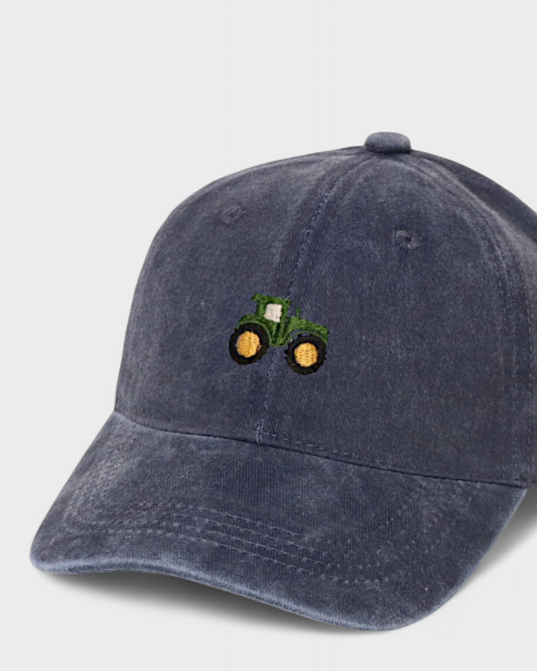 Tractor Personalised Hat with hand-drawn tractor embroidery on front, made of 100% washed cotton.