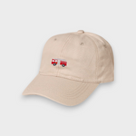 Beige personalised baseball hat with embroidered red fire truck design on front, made of 100% washed cotton.