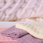 Merino baby blanket with moon and stars design in cream, pink, and purple colors.