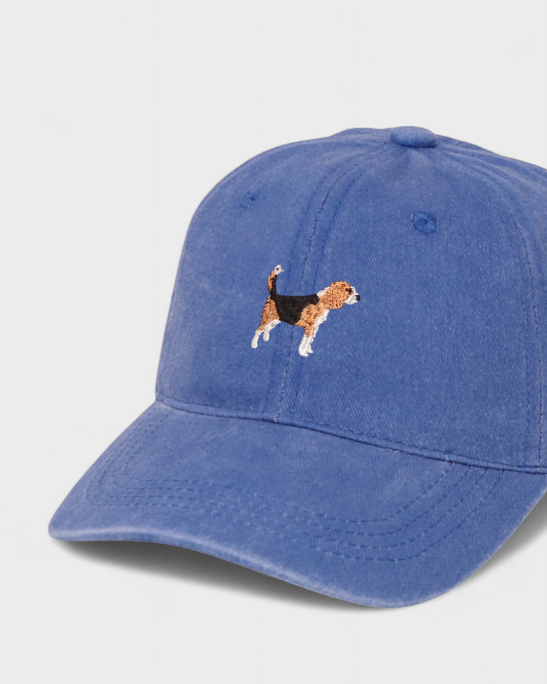 Beagle personalised hat with hand-drawn embroidery on blue cotton baseball cap.