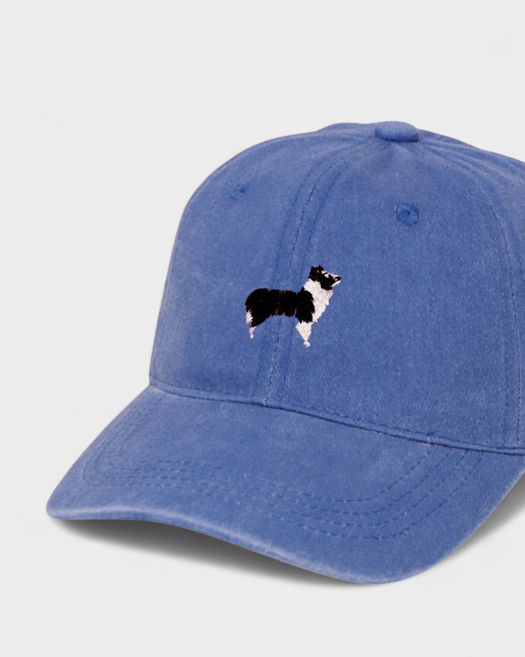 Border Collie embroidered personalised hat in blue cotton.