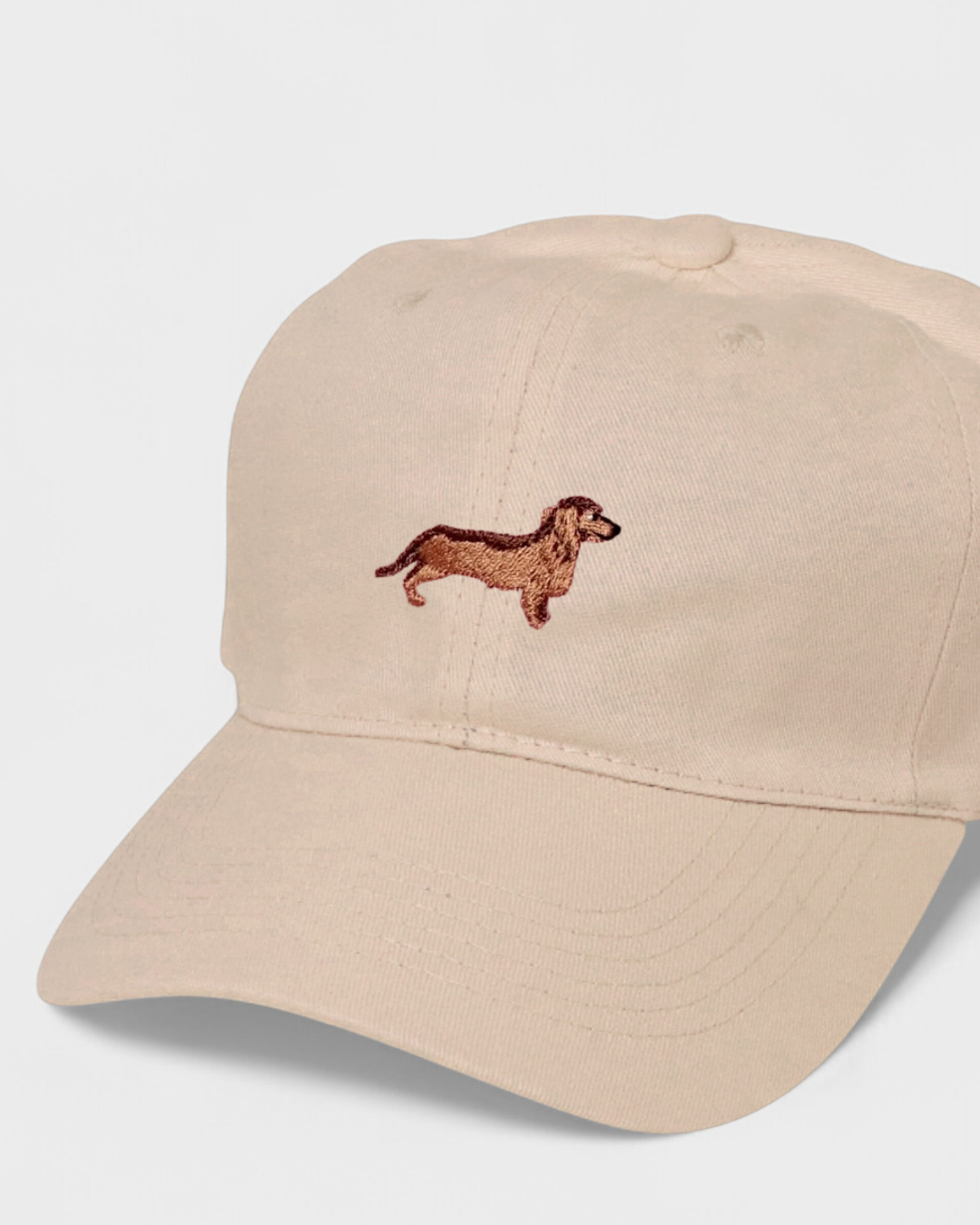Dachshund personalised hat with embroidered design on front.