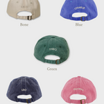 Set of personalised hats in bone, blue, green, navy, and pink with embroidered names on the back and Hydrangea embroidery on the front, made of 100% washed cotton.