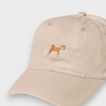 Beige baseball cap with embroidered Shiba Inu design, personalised embroidered text option, made of 100% washed cotton.