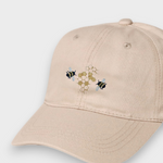 Bees personalised hat with embroidered bees and honeycomb design on beige baseball cap made of 100% washed cotton