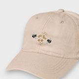 Bees personalised hat with embroidered bees and honeycomb design on beige baseball cap made of 100% washed cotton