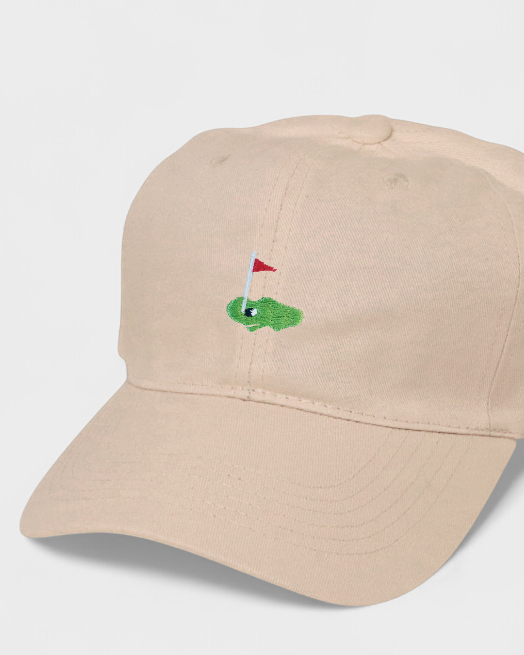 Personalised baseball cap with embroidered golf course design, 100% washed cotton.