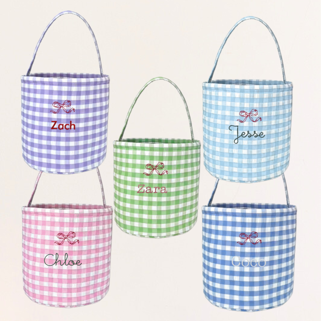 Personalised gingham Easter buckets with hand-drawn embroidery designs.