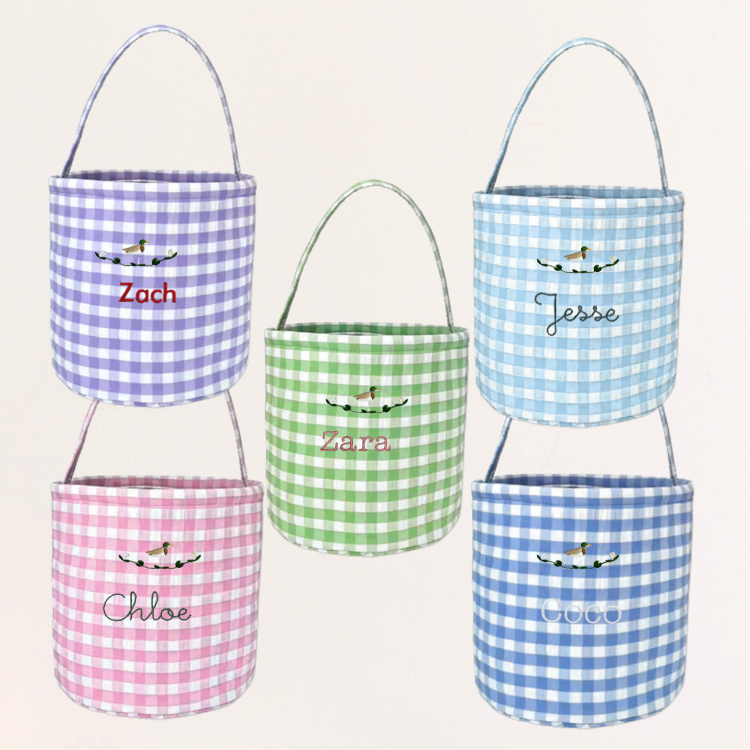 Gingham personalised Easter buckets with hand-drawn embroidery designs.