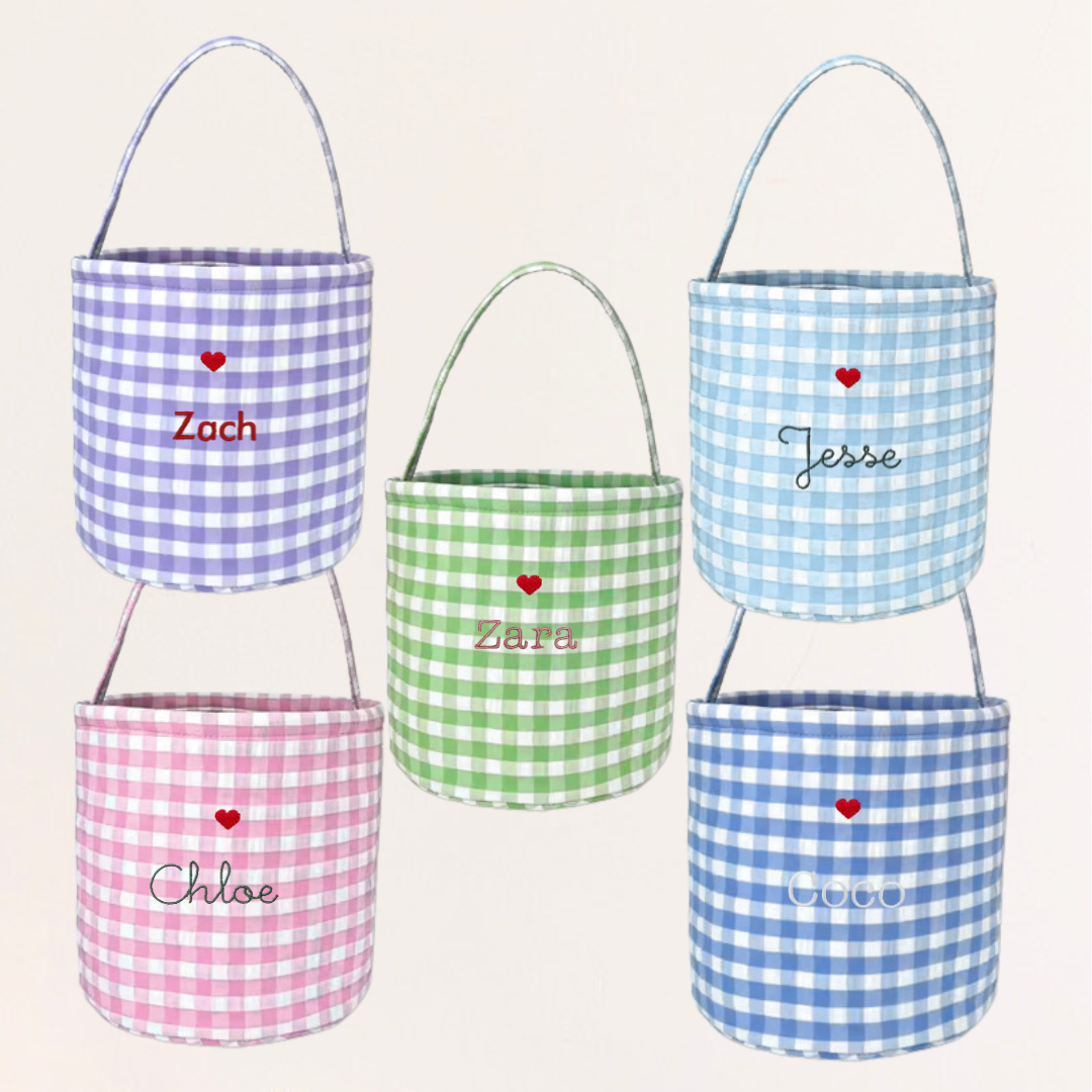 Personalised gingham Easter buckets with hand-drawn embroidery designs.