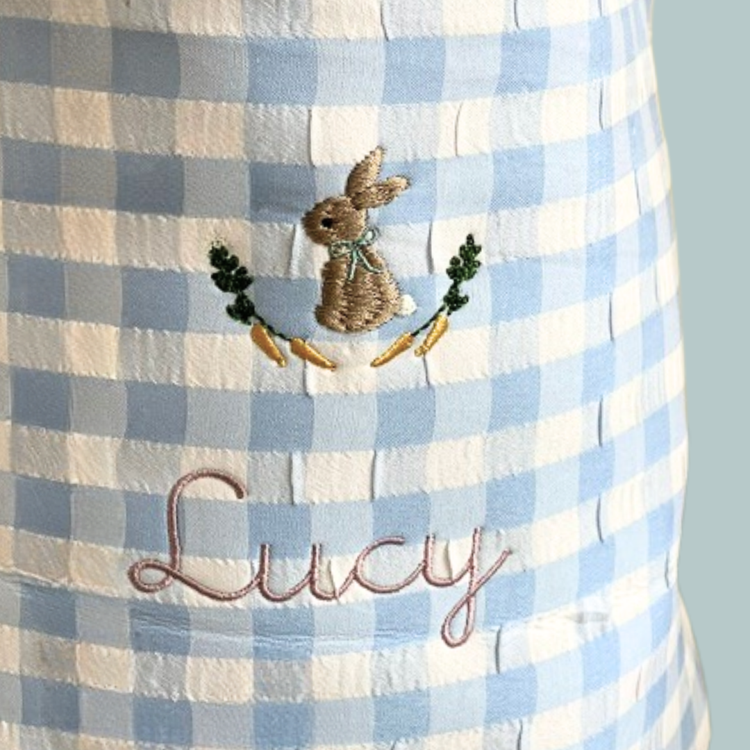 Personalised Easter Bucket with bunny and carrots embroidery on blue gingham fabric.