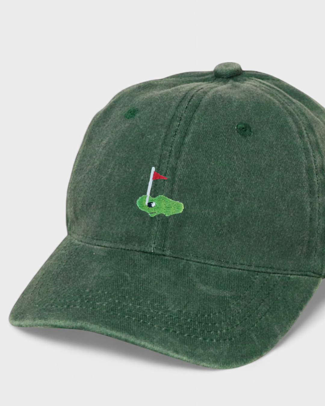 Green embroidered "Hole In 1" personalised hat made of 100% washed cotton in classic baseball style.