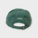 Green personalised baseball hat with custom embroidered name on back strap adjustment