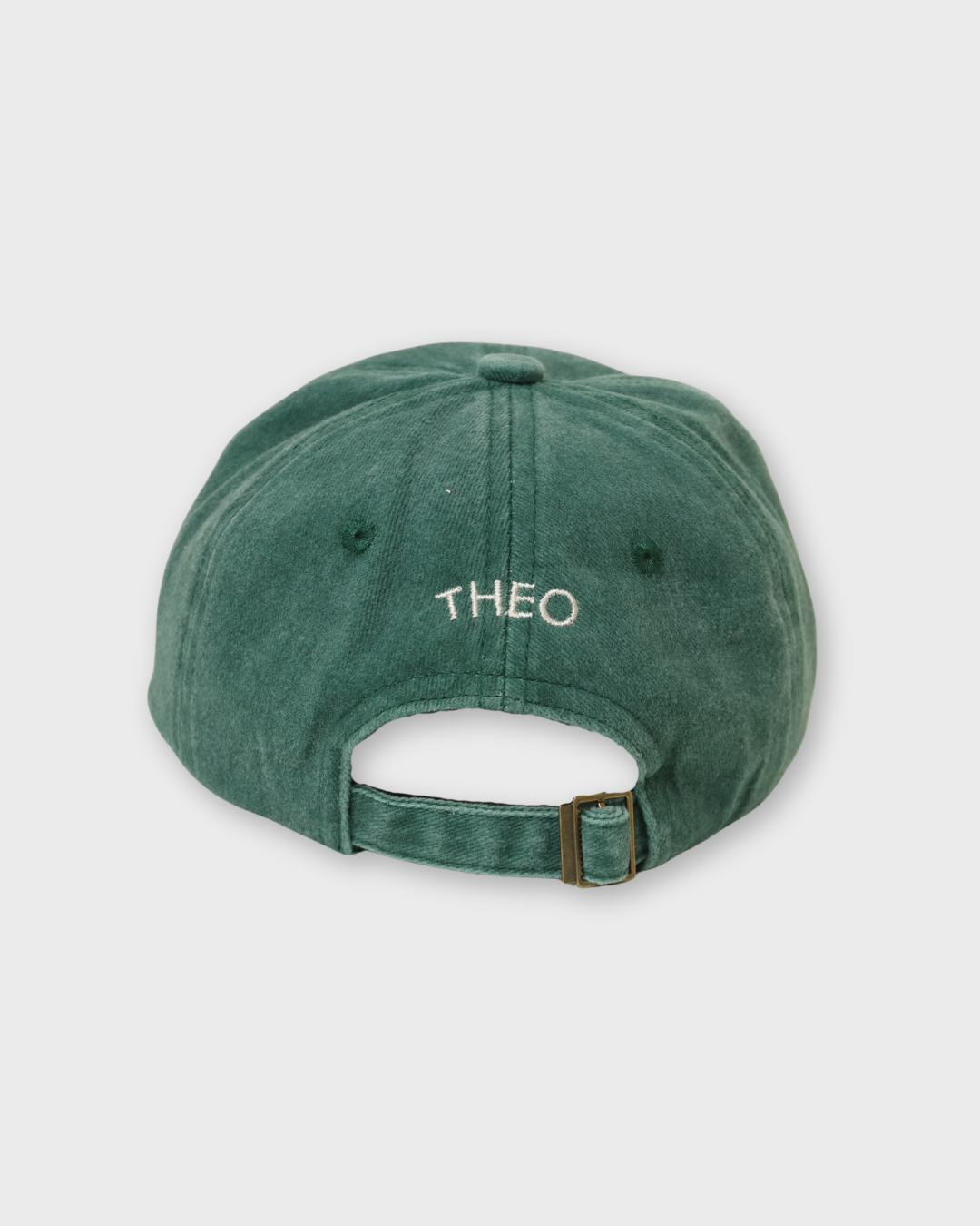 Green washed cotton baseball cap with personalized embroidered text "THEO" on the back, Bees Personalised Hat