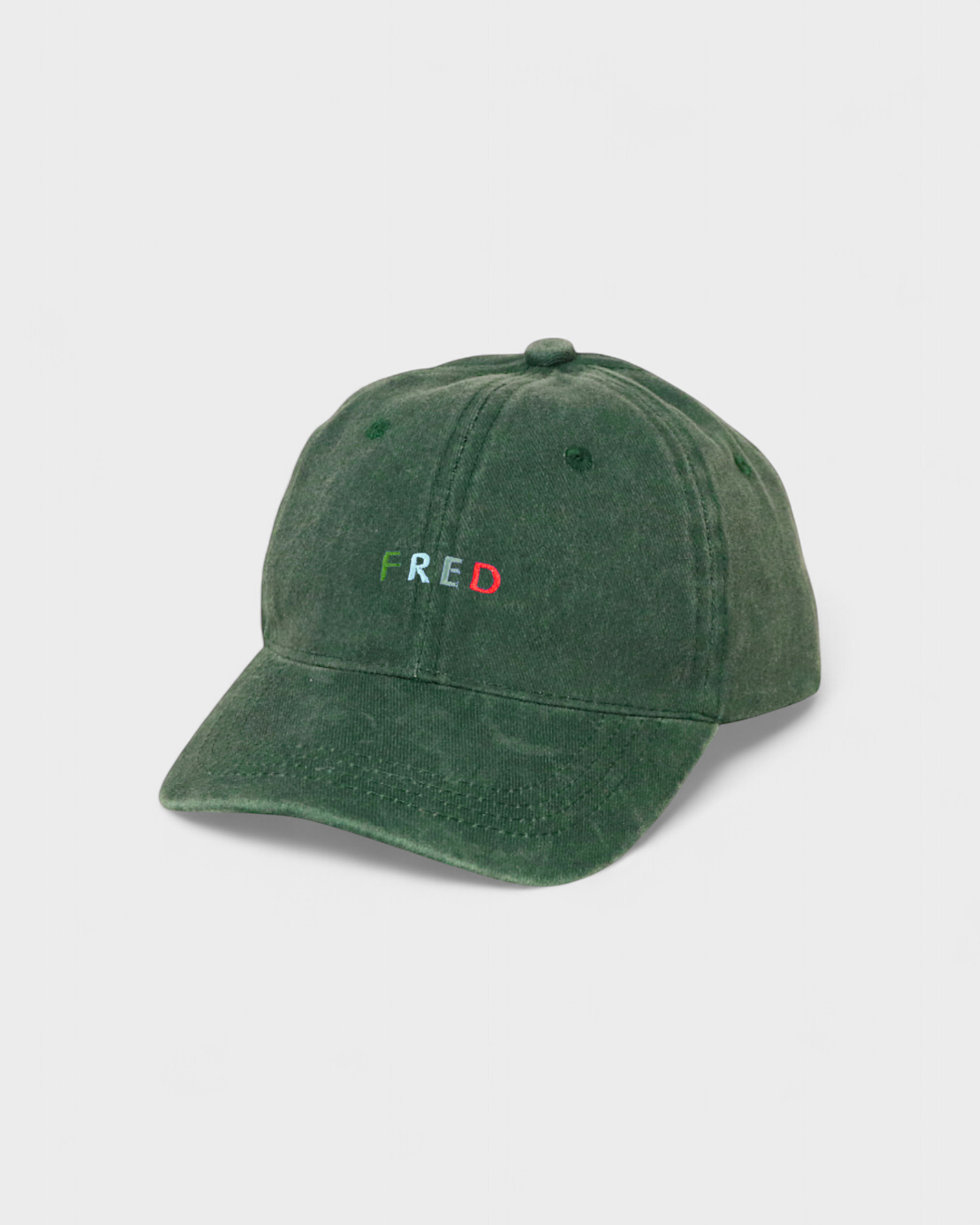 Personalised hat with multi-colour text on green washed cotton fabric.