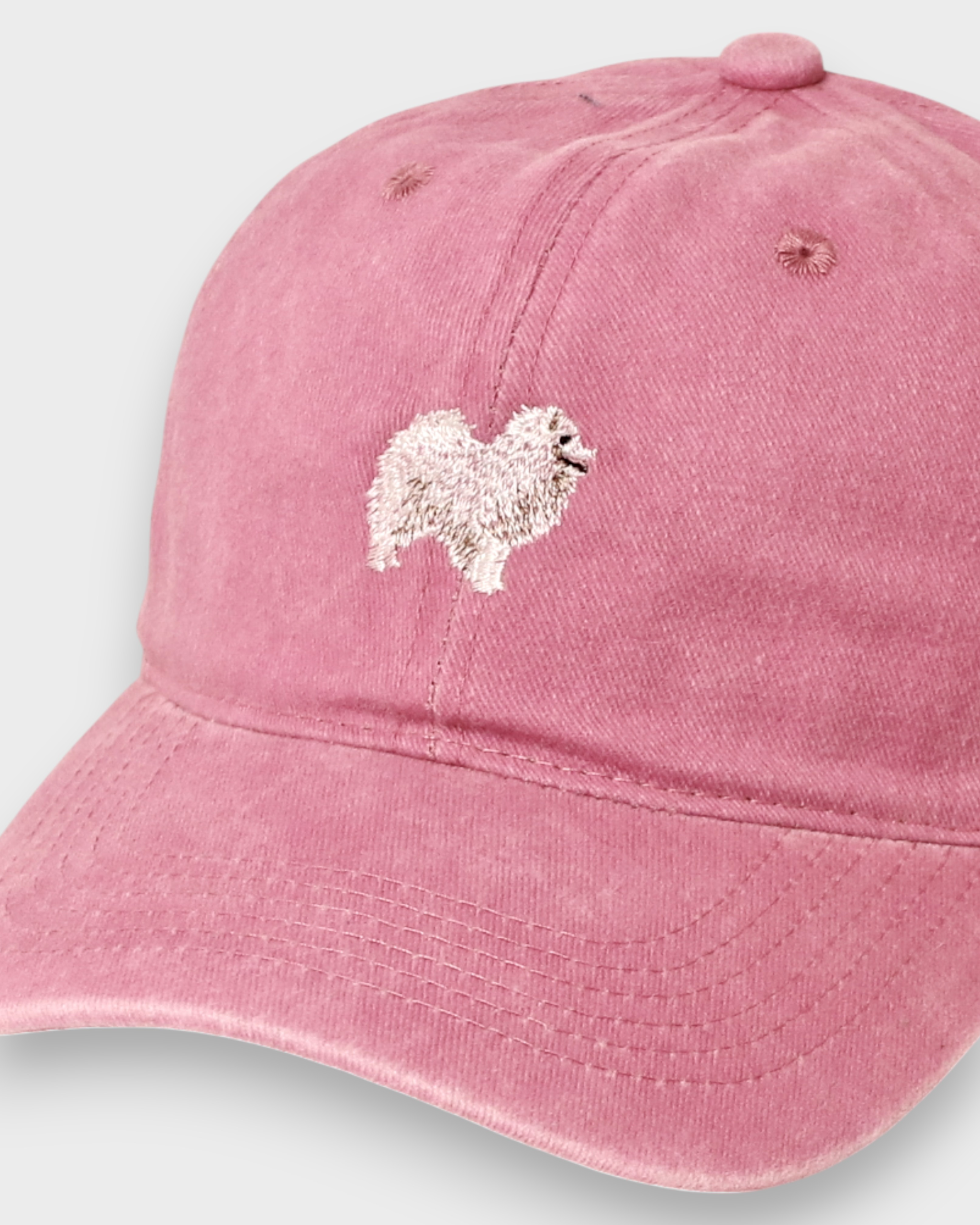 Japanese Spitz personalised hat with embroidered design on front, classic baseball fit, pink color.