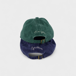 Love heart personalised hats in green and navy blue with custom embroidery on the back.