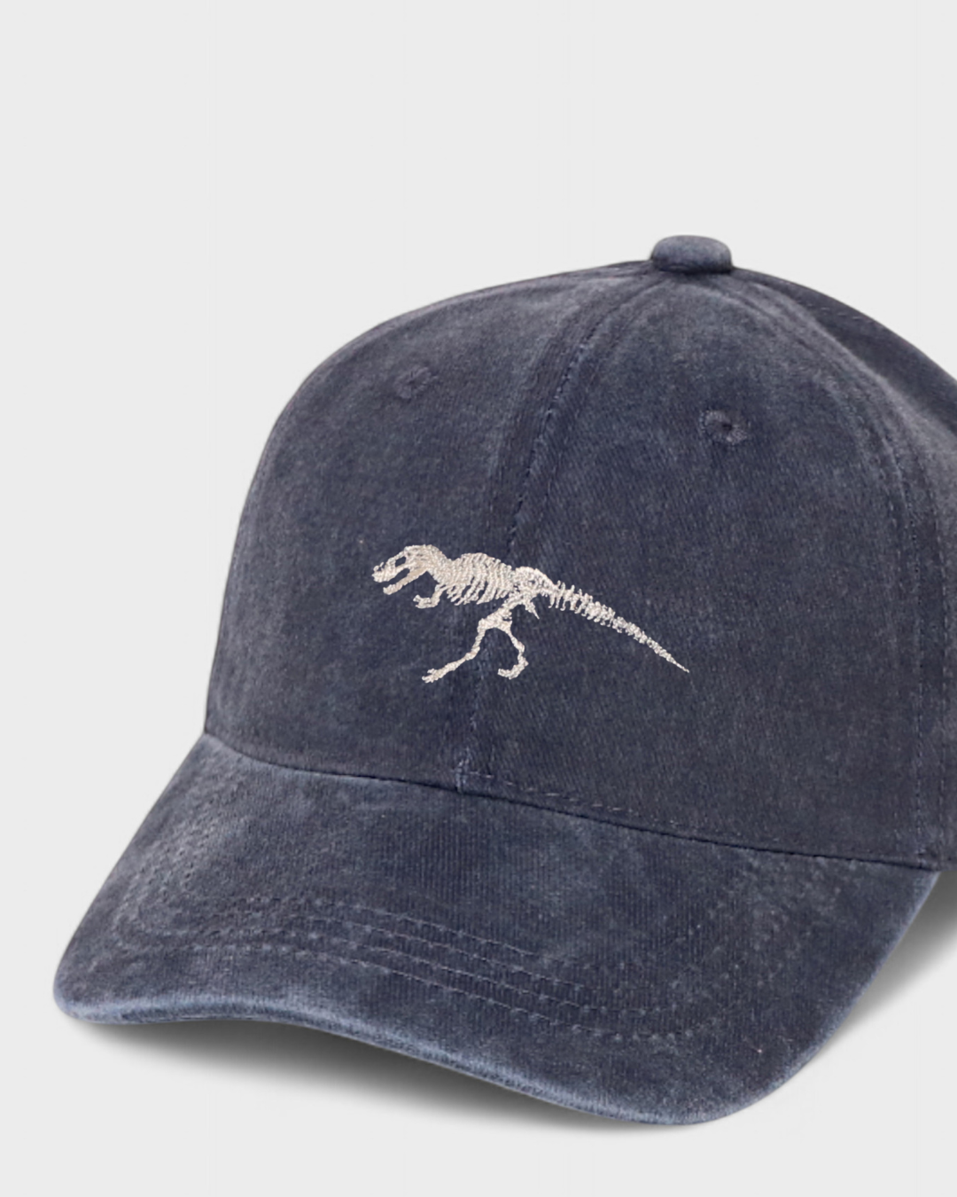 T-Rex embroidered personalised hat in washed cotton baseball style.