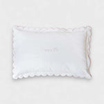 Toddler pillowcase with blush scalloped edge in organic cotton.