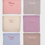 Merino Baby Blanket with Rosette Design and personalized embroidery.