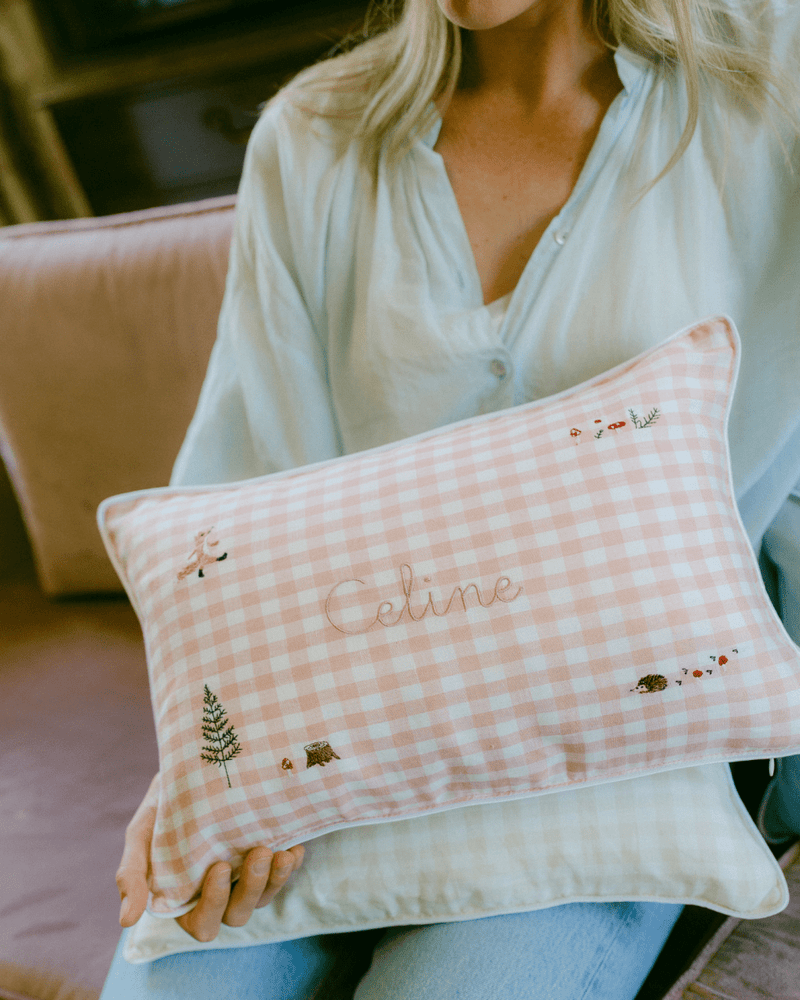 Embroidered linen cushion
